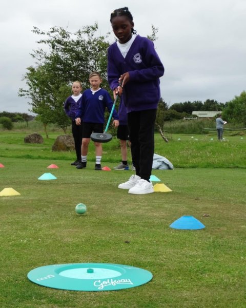 Children playing golf